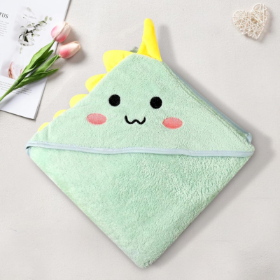 Cape-bain-bebe-capuche design-dinosaure-pliée