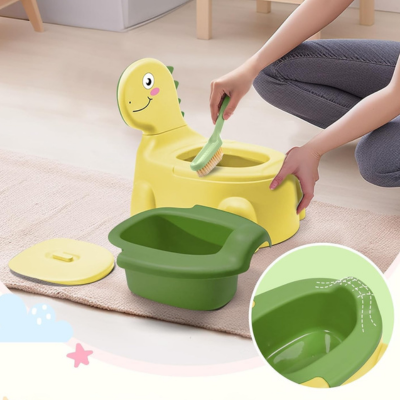 nettoyage cuvette pot bebe dinosaure jaune avec brosse