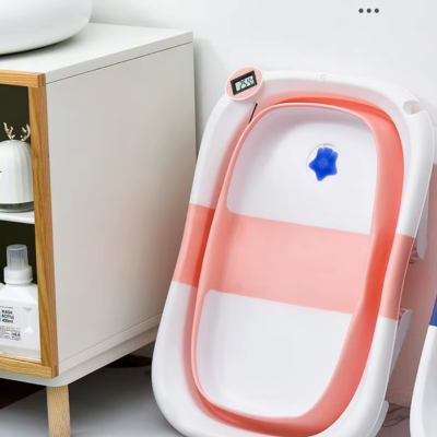 rangement contre mur baignoire bébé pliable pour gain place
