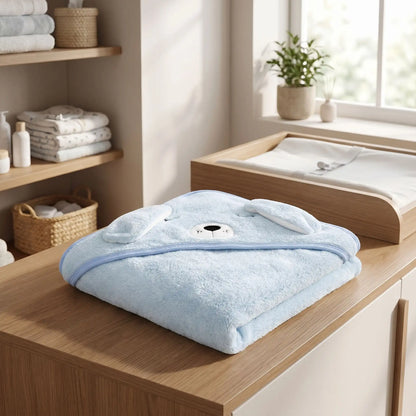 cape de bain bébé caninou serviette pliée